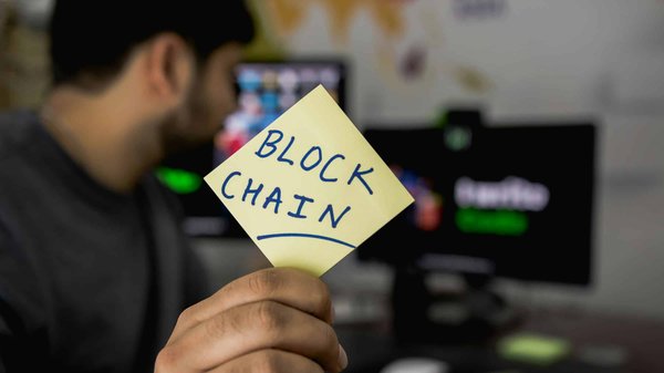 How can blockchain technology improve the efficiency of supply chain management?